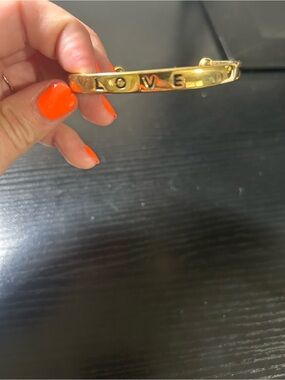 Kinsley Armelle Gold LOVE Engraved Bangle Bracelet